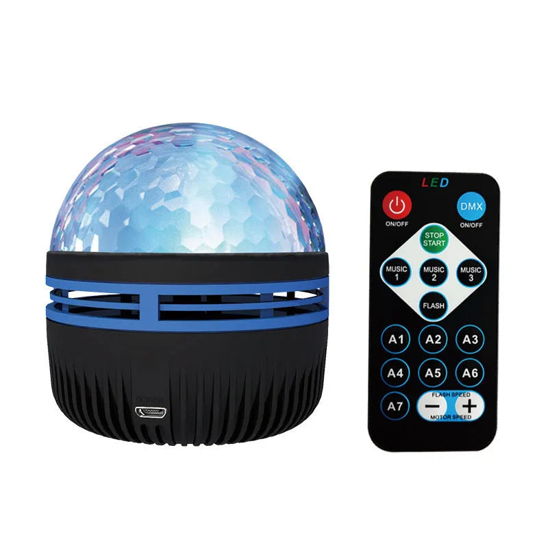 LED rotating magic ball galaxy projector lamp with remote control on a bedside table.