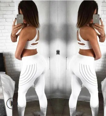 Women's black workout leggings with glow in the dark print pattern for fitness activities