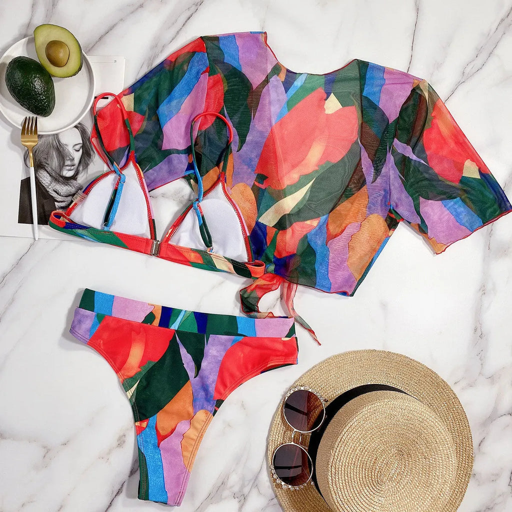 Red printed women's split swimsuit in nylon fabric for swimming.
