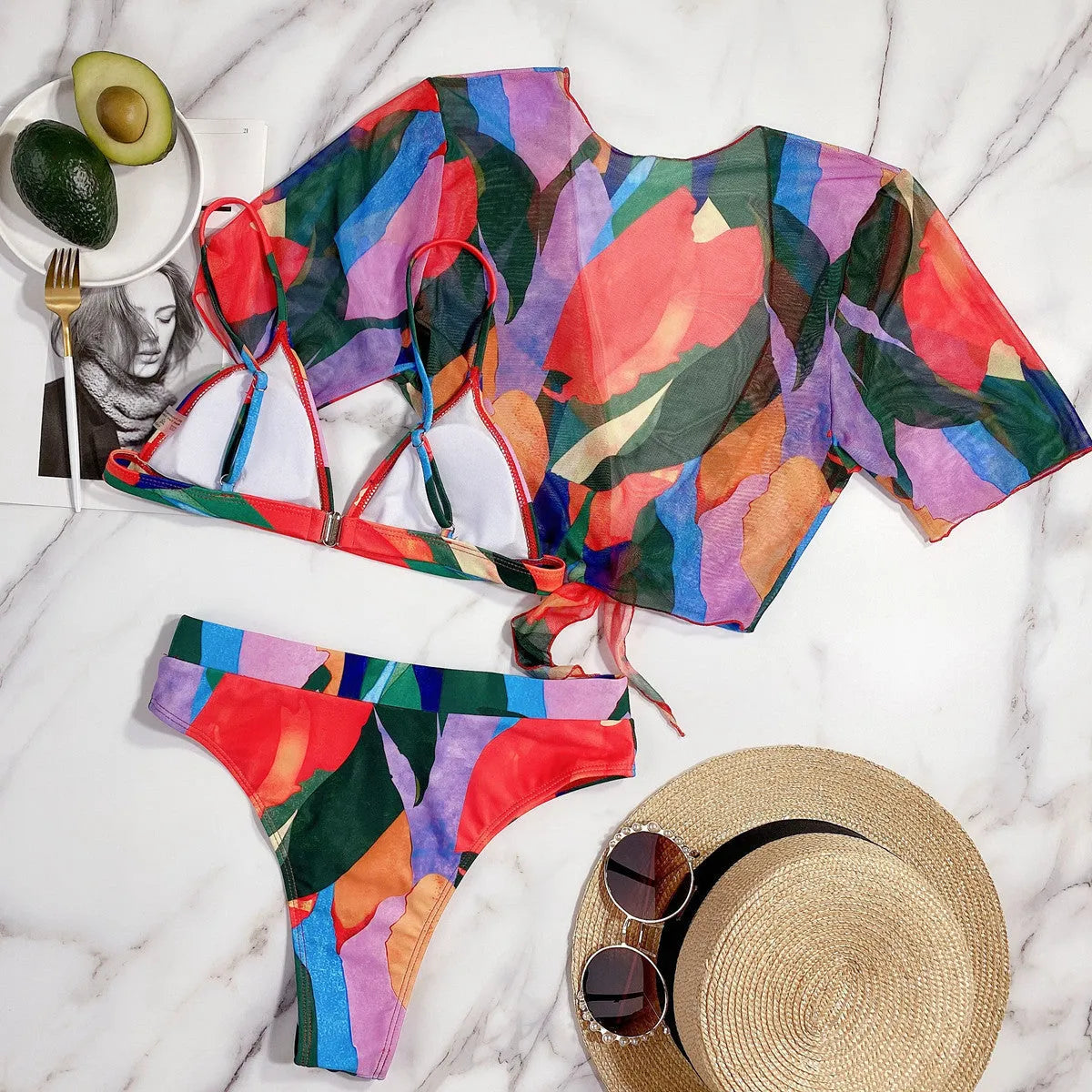 Red printed women's split swimsuit in nylon fabric for swimming.