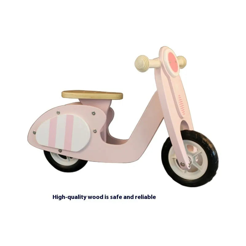 Pink wooden balance scooter for toddlers aged 1-6 years, 10 inches in size.