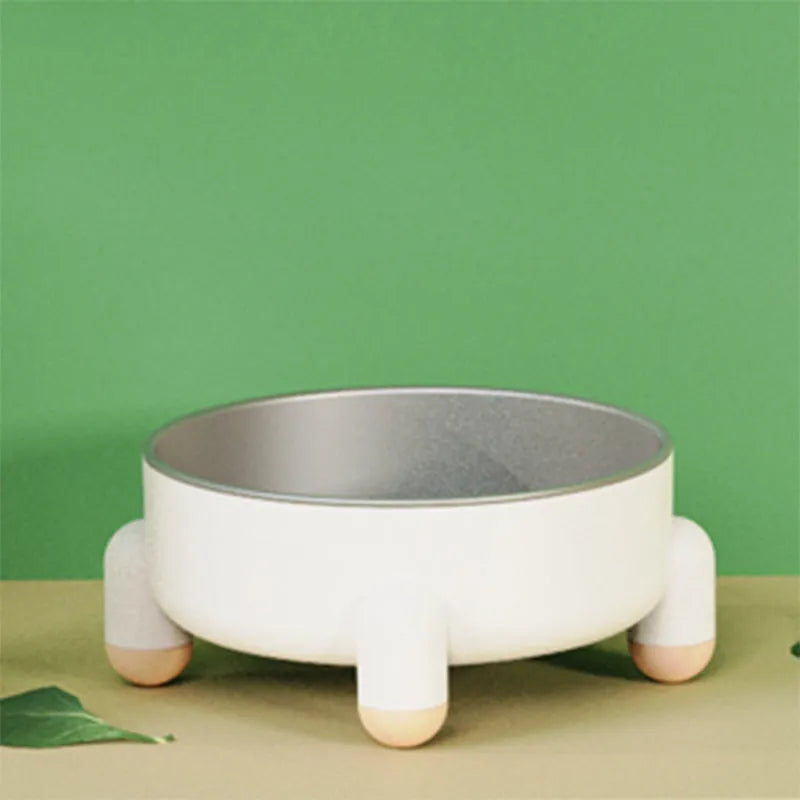 Green stainless steel pet bowl with a non-slip base and raised high-foot design.