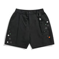 Black loose-fit men's shorts with a semi-elastic waistband and zipper fly, shown above the knee.