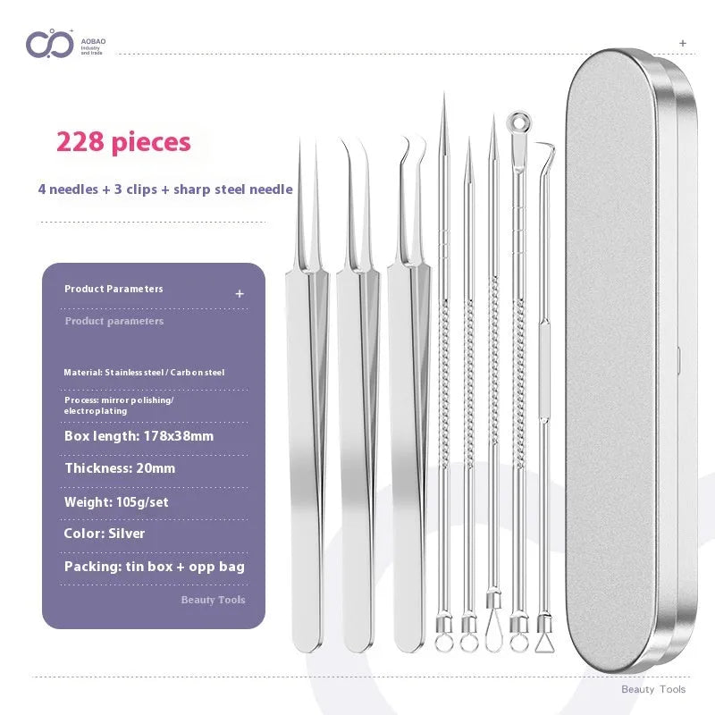 Four silver metal acne needles with fine pointed tips laid out on a surface.