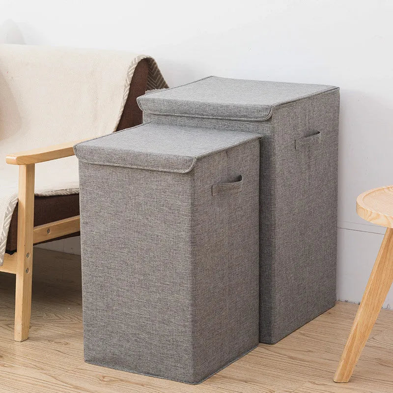 Foldable cotton linen storage basket in a neutral colour, shown in its three-dimensional form ready for use.
