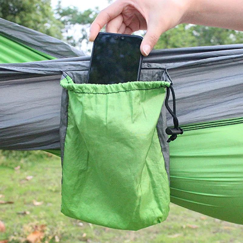 Blue nylon parachute cloth outdoor hammock with 300kg capacity hanging between trees