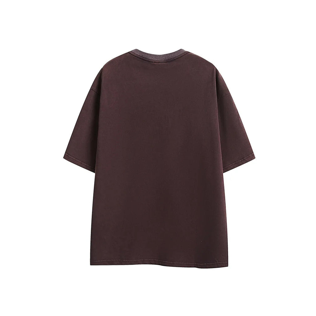 Retro loose fit short-sleeved t-shirt with embroidery on washed cotton fabric in purple.