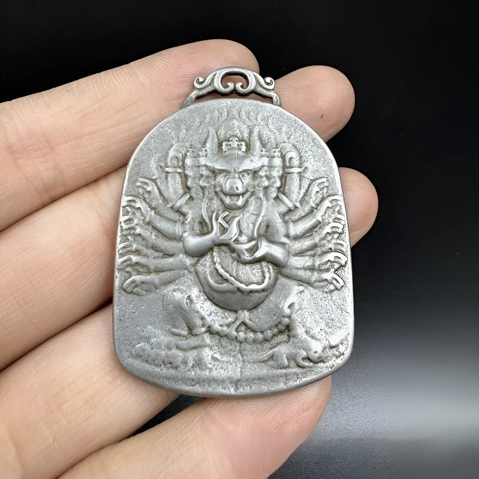Iron metal pendant ornament with Chinese geometric style and Yamantaka deity depiction.
