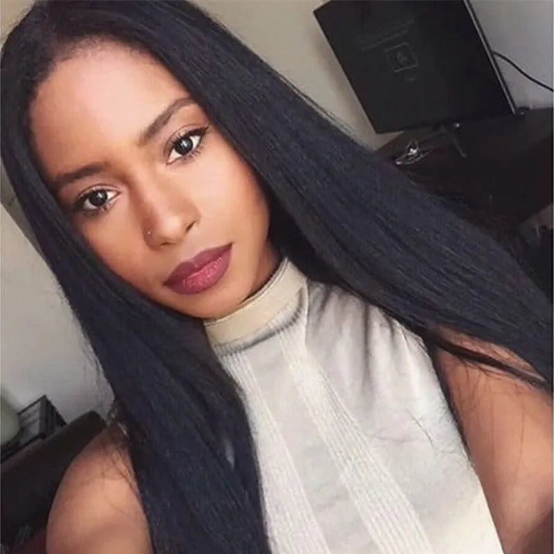 Long straight black synthetic wig with centre-parted bangs on mannequin head