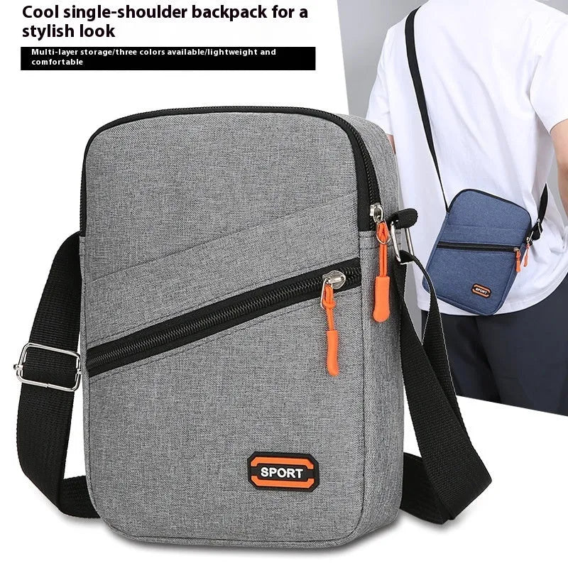 Oxford cloth crossbody shoulder bag in silver grey with contrast colour details and urban simplicity styling