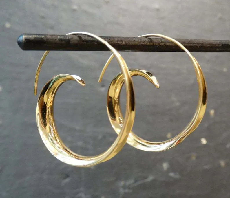 Round alloy ear studs with spiral leaf design in gold electroplated finish on white background
