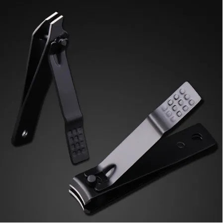 7-piece nail clippers manicure set with eyebrow scissors and ear spoon on white background