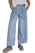 Beau Blue wide leg denim trousers with drawstring waist and raw hem finish laid flat