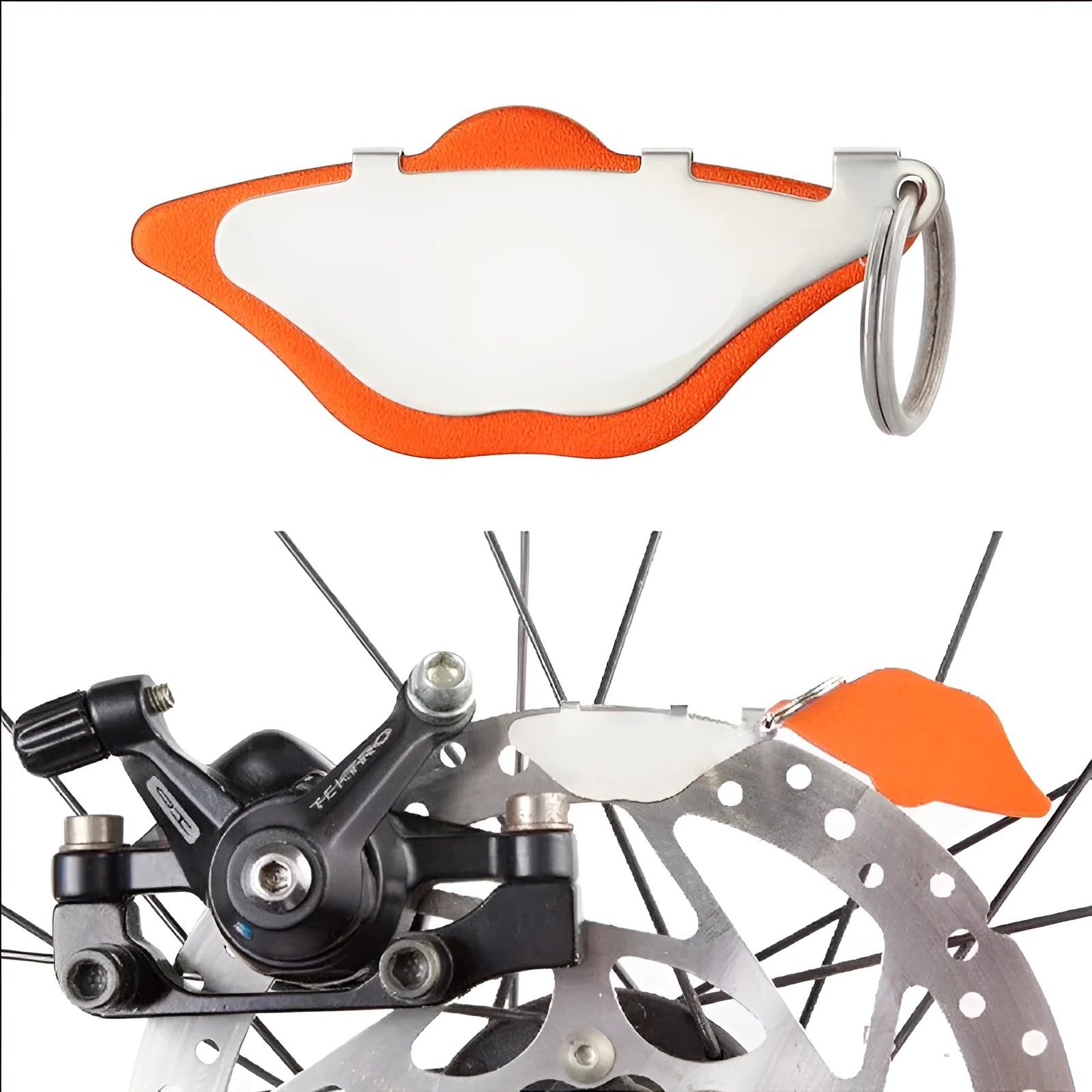 Mountain bike disc brake pads with scratch-resistant grinding disc in black and orange colours