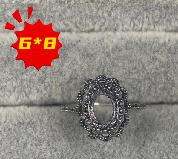 Oval open mouth copper ring with 6x8 mm star and denier pattern ornament.