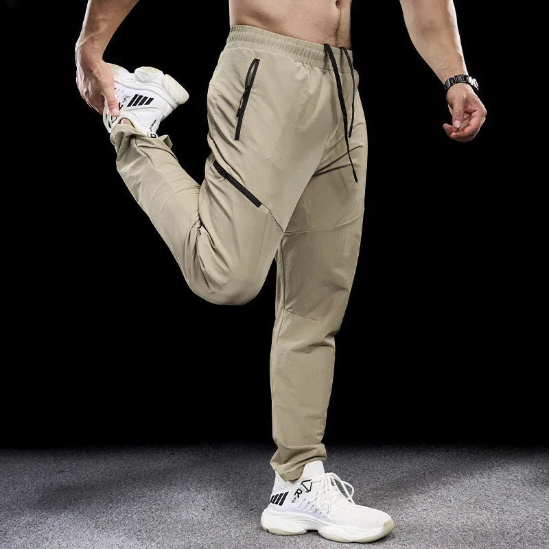 Men's waterproof quick-dry workout trousers in nylon fabric showing colour options