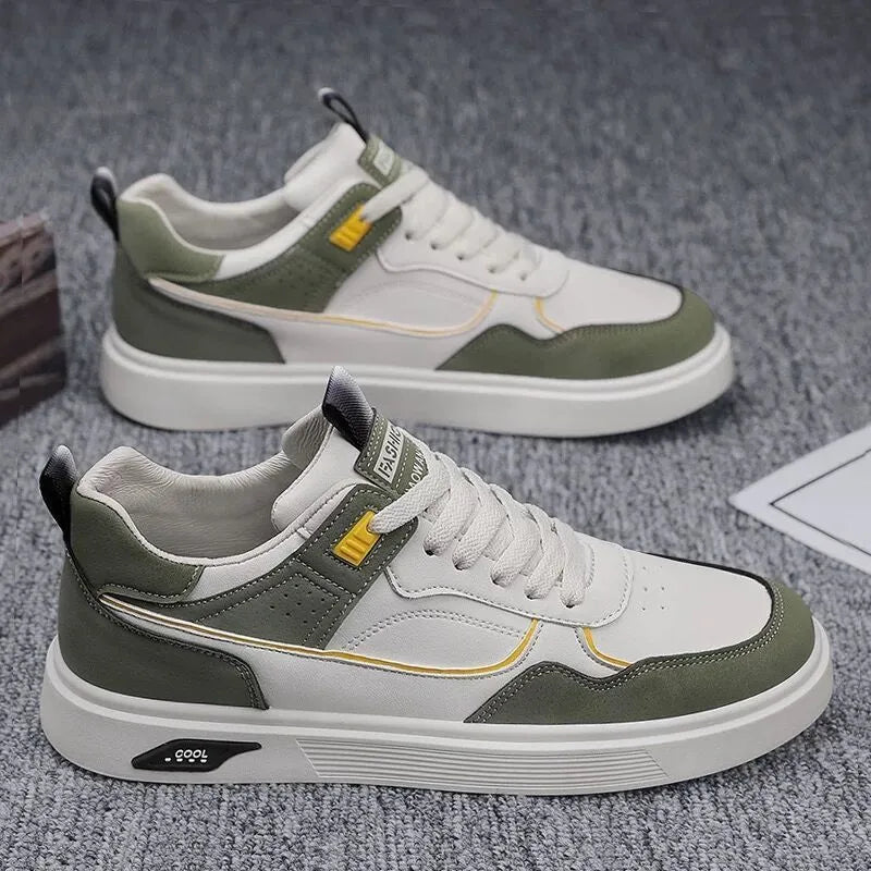 Men's low-top canvas board shoes in solid colours with leather stitching and mesh lining.