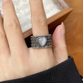 Retro wide-faced adjustable heart ring in white or green with white copper plated silver construction