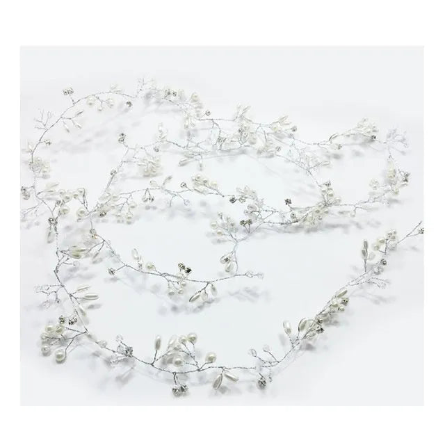 Silver wedding hair band with crystal and pearl decoration for long hair styling