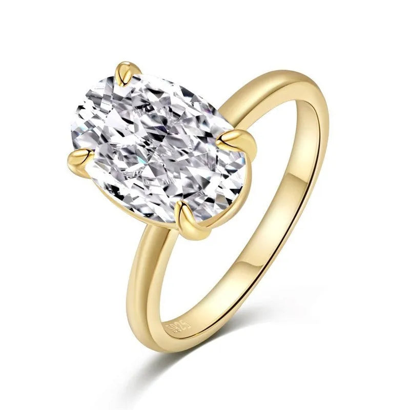 Oval gemstone ring in four-claw setting, available in gold and silver colours