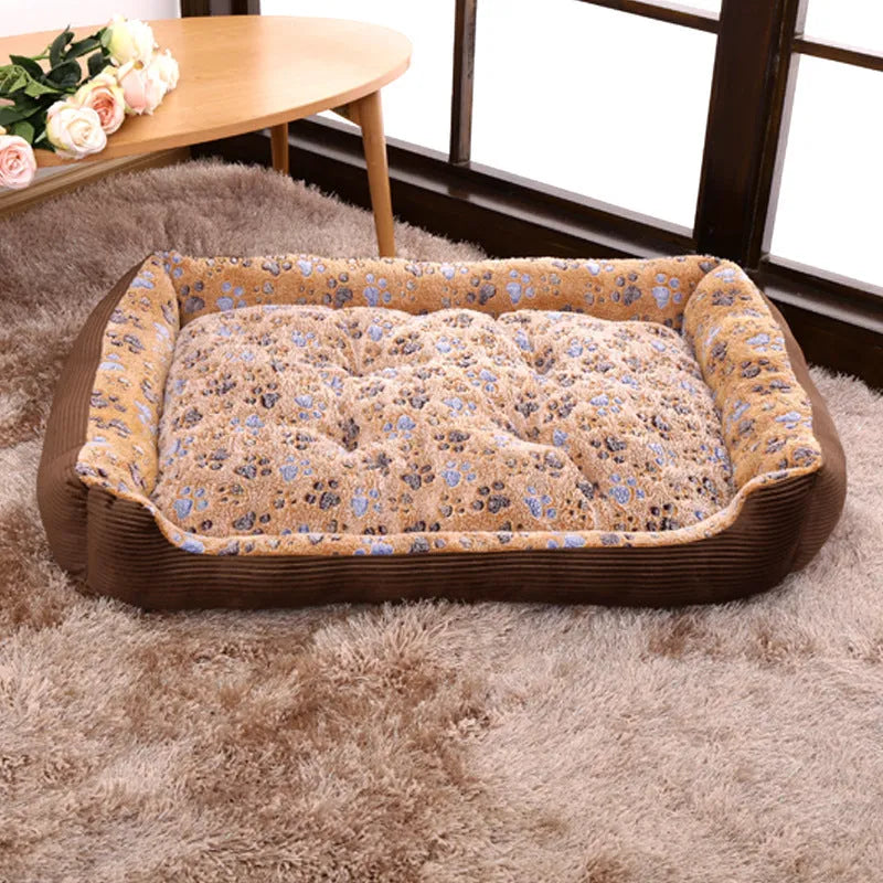 Plush sofa-style dog bed with raised sides in beige colour for small dogs