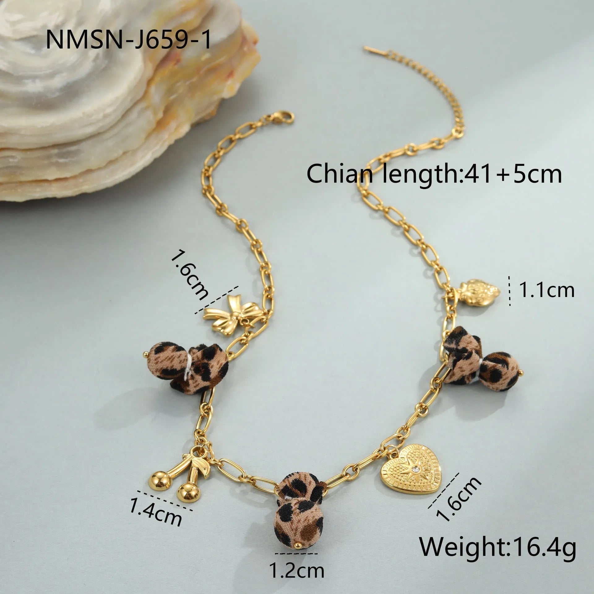 Stainless steel necklace with geometric pendant showing leopard spots, love hearts and flowers in gold finish