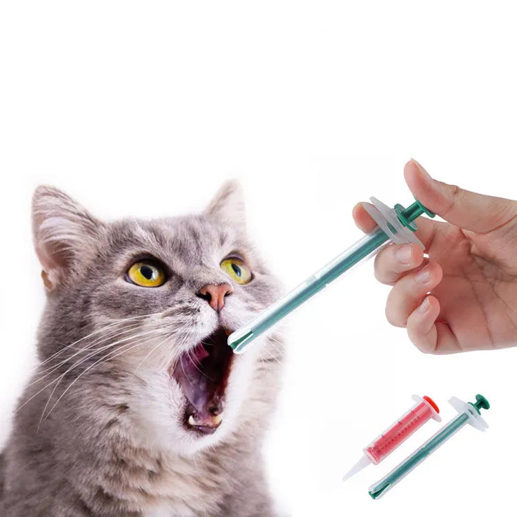 Two silicone pet pill shooters with soft tips for administering medication to cats and dogs