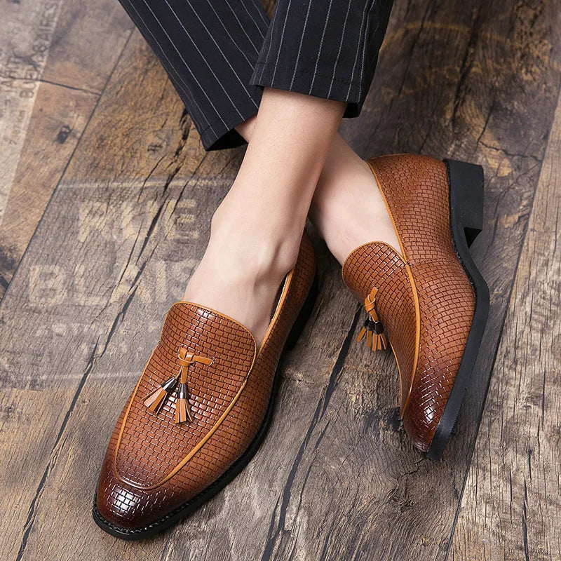 Men's black pointed toe slip on loafers with tassel detail on artificial PU leather upper