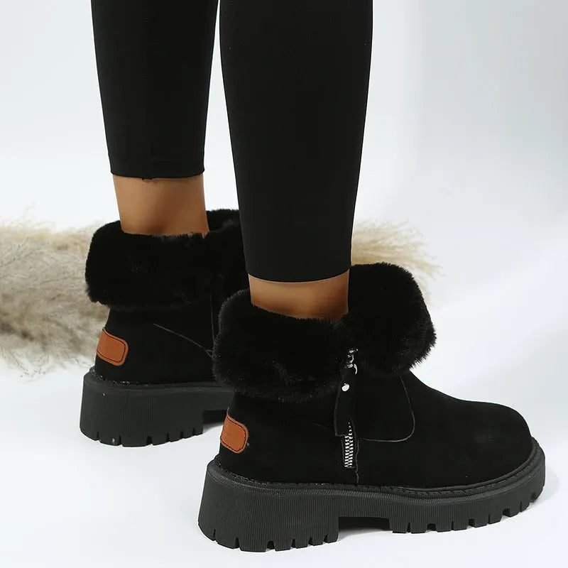 Women's black thick plush snow boots with faux suede upper, side zip, and non-slip rubber sole.