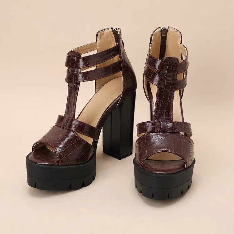 Platform high heel sandals in black with round toe, back zipper, and rubber sole