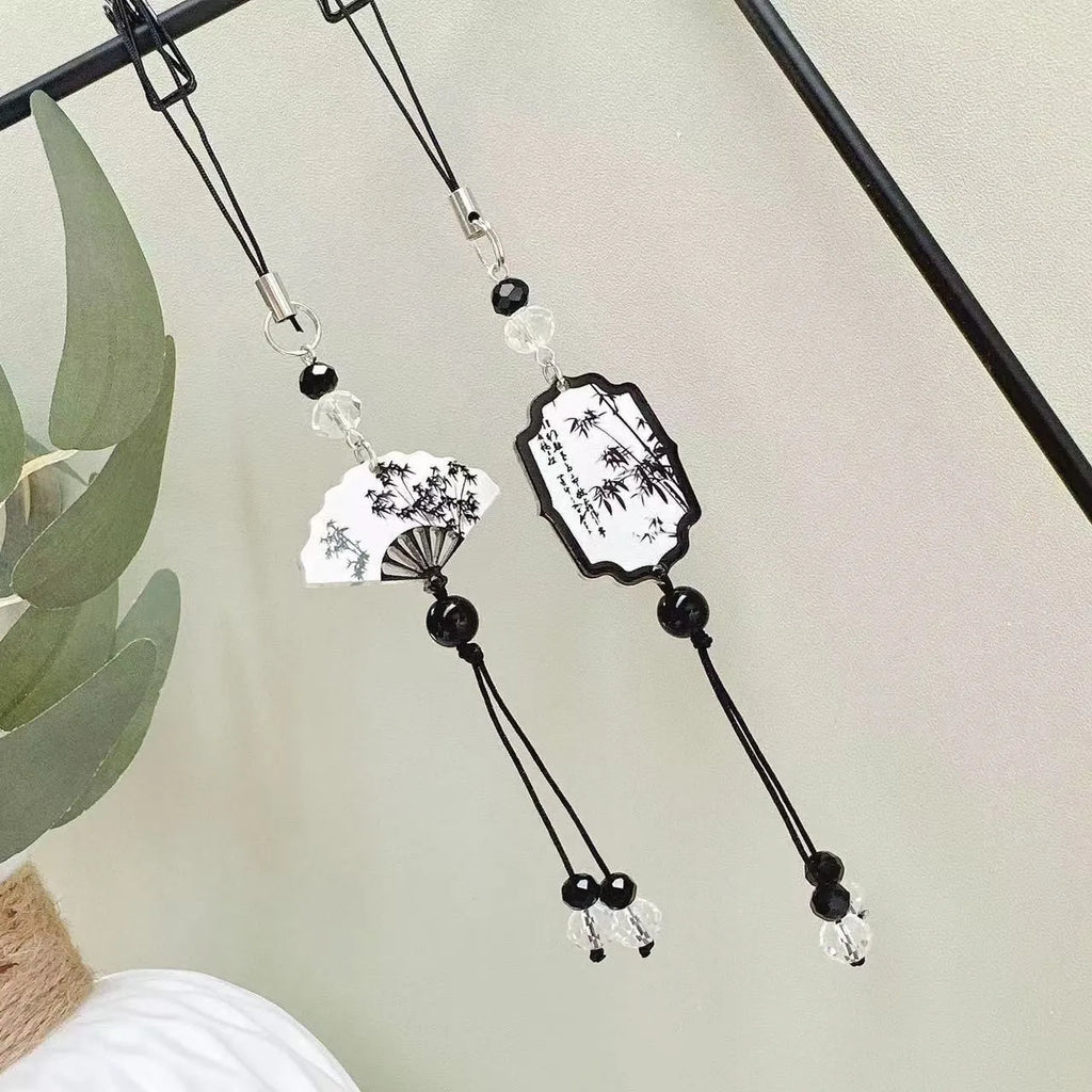 Chinese style floral pendant keychain with glossy baked varnish finish on a bead base