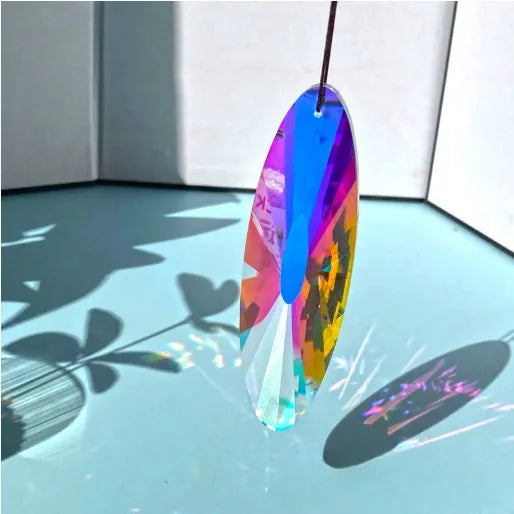 Rainbow electroplated crystal Christmas tree pendant decoration for garden or indoor hanging.