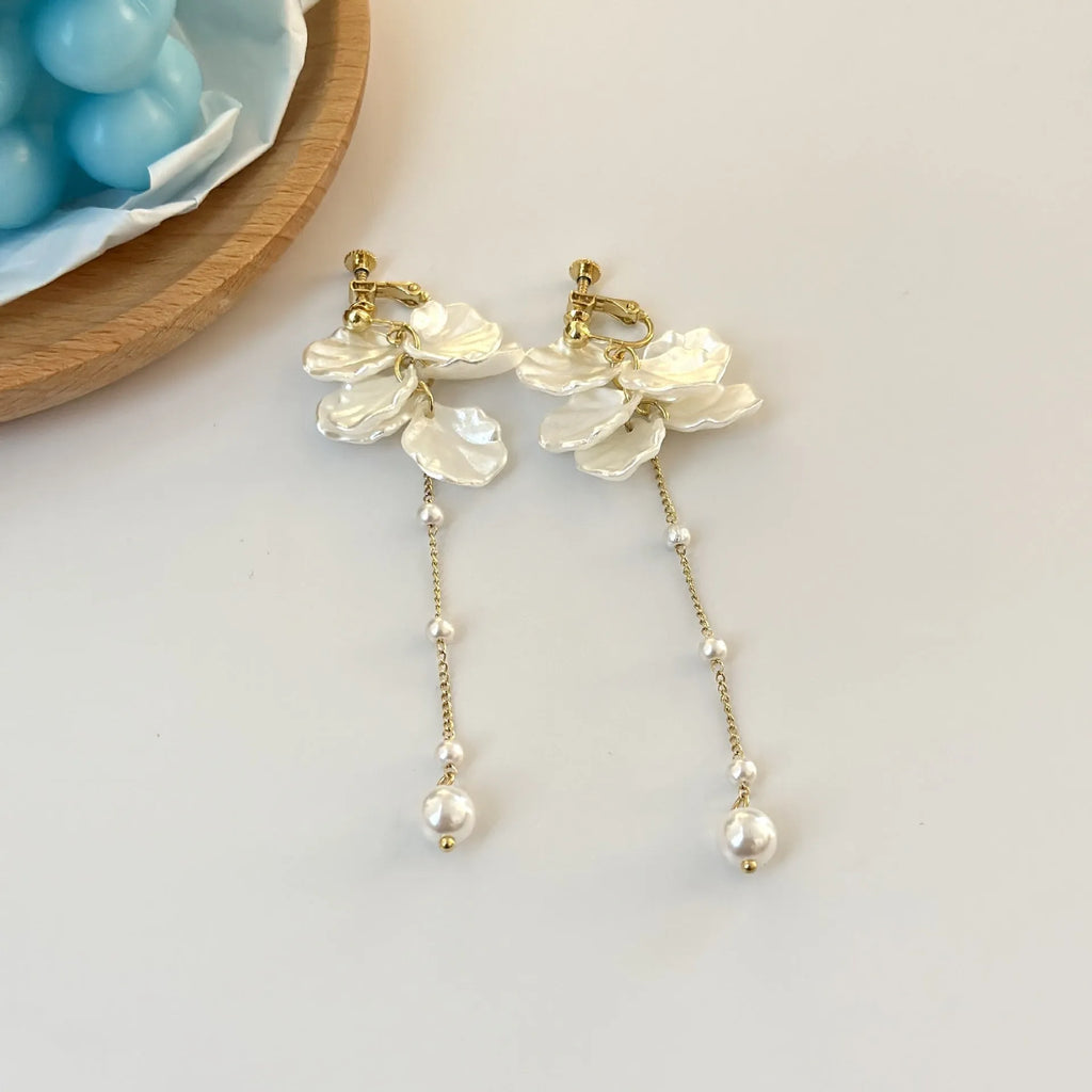 Women's acrylic shell pearl tassel earrings showing 8.8cm length and four ear clip options