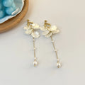 Women's acrylic shell pearl tassel earrings showing 8.8cm length and four ear clip options
