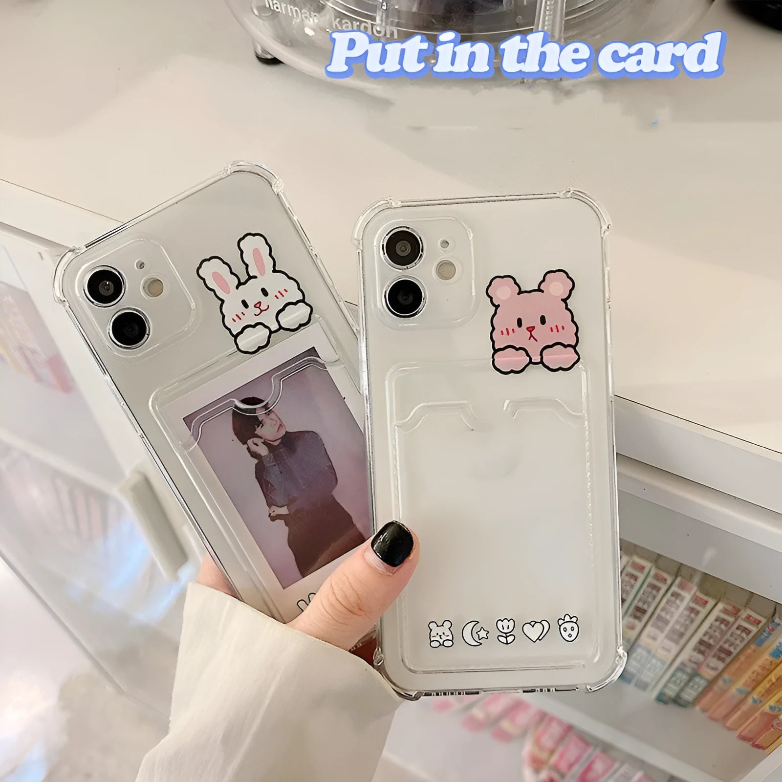 Cartoon design transparent TPU iPhone case with integrated card holder slot.