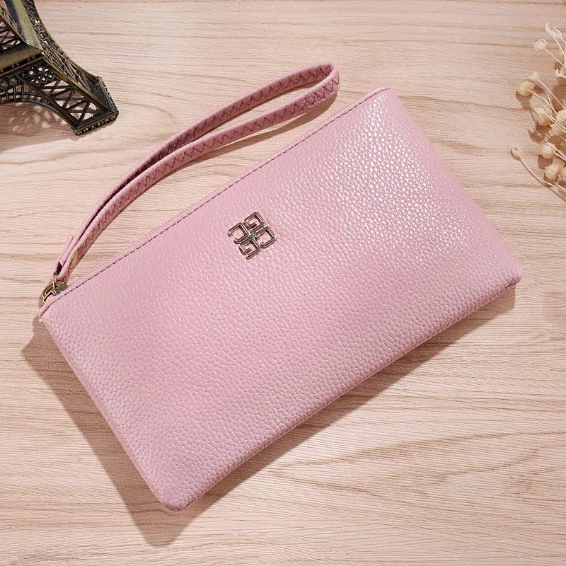 Long 55-inch phone wallet handbag in a choice of colours with zipper closure and sewing line detail