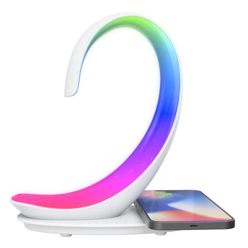 White swan shaped desktop wireless charger with Bluetooth speaker and colourful ambient lighting