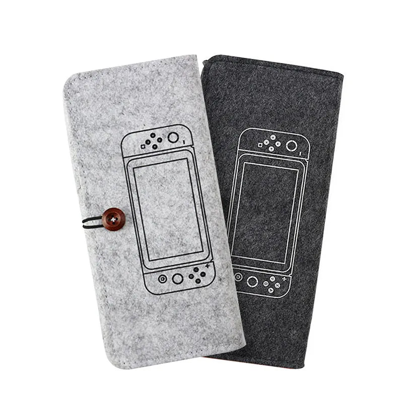 Black felt carrying pouch for Nintendo Switch open to show console compartment and game card slots