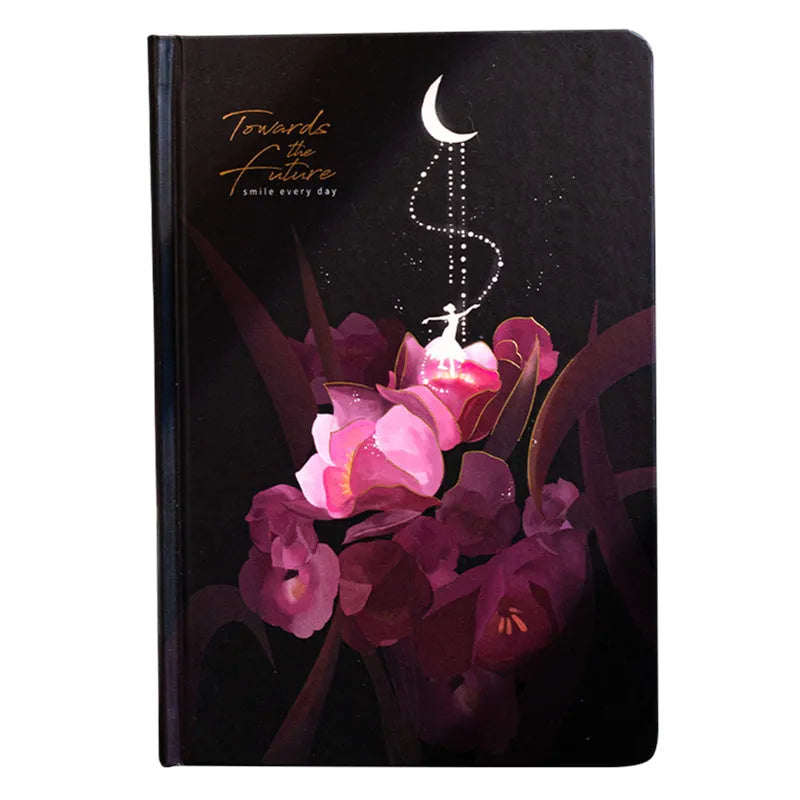 Four A5 hardcover notebooks with luminous covers in deep blue, gold, light blue, and purple colours.