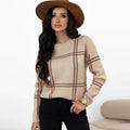 Women's loose fit plaid colour-block sweater with apricot, black, beige, red, and green stripes, crew neck pullover.