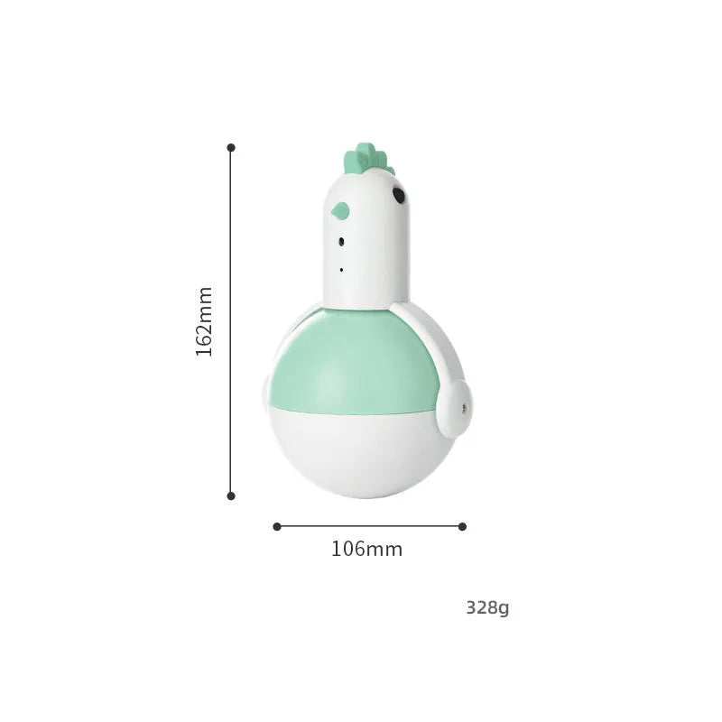 Green electric cat toy chicken with laser light and sound functions on flat surface