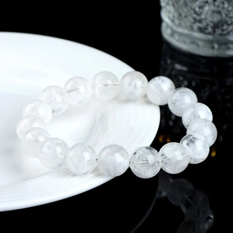 Women's crystal bracelet with geometric natural blizzard snowflake beads and Ruyi design elements