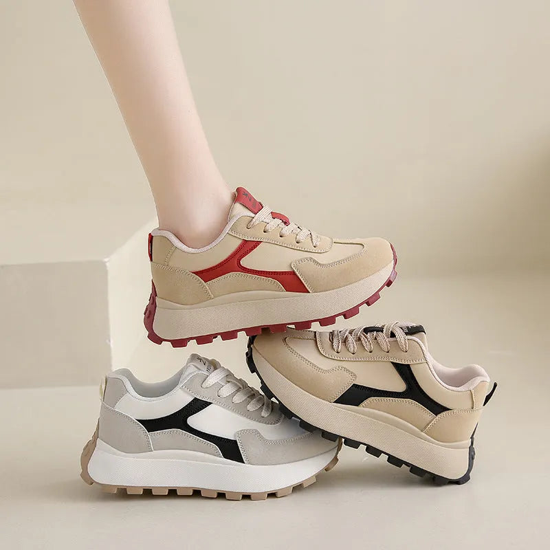 Women's solid colour low-top platform sports shoes with a rubber sole and front lace-up.