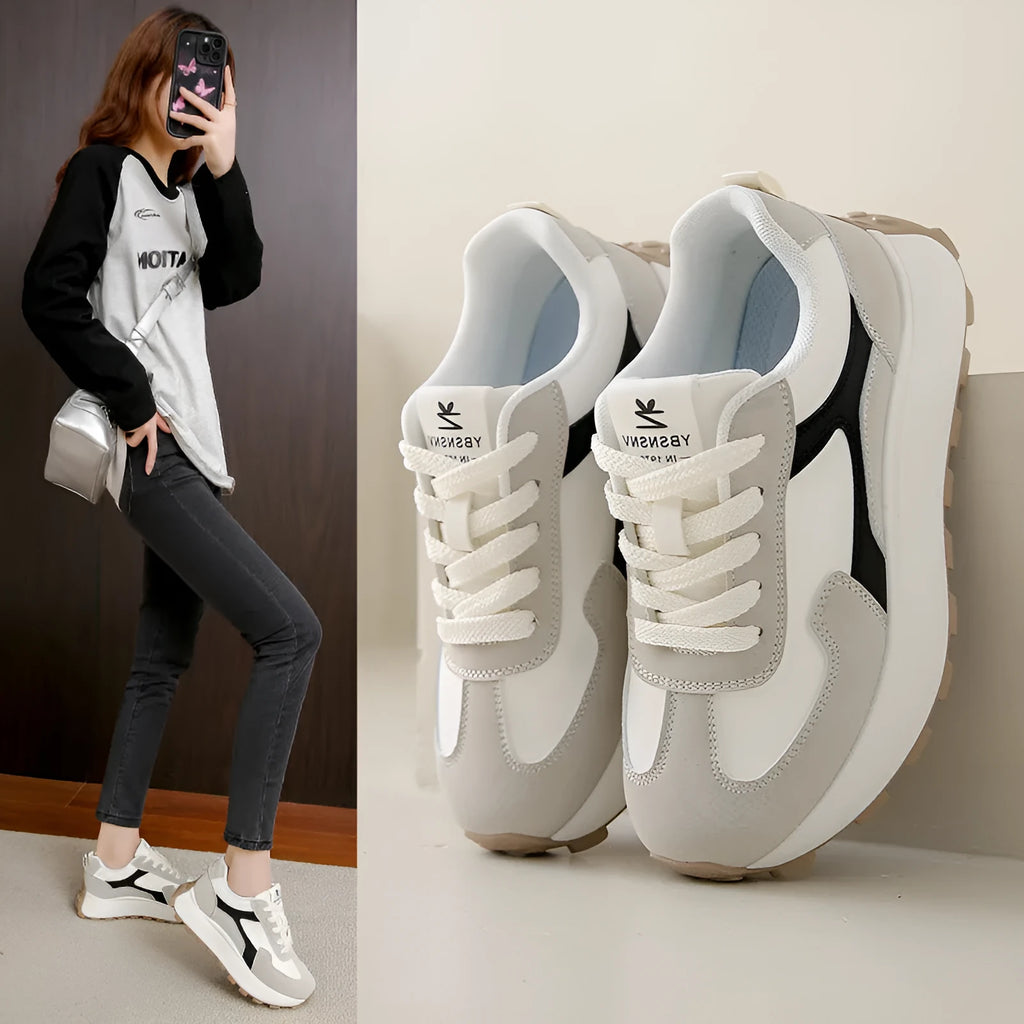 Women's solid colour low-top platform sports shoes with a rubber sole and front lace-up.