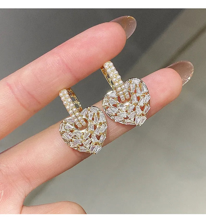 Heart shaped copper earrings with yellow finish and zircon stone for women