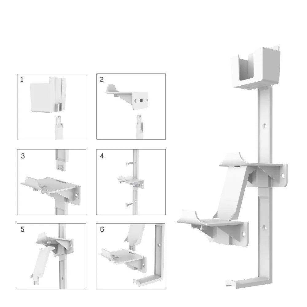 White wall-mounted hook holding PS5 controller with black gaming headset hanging beside it