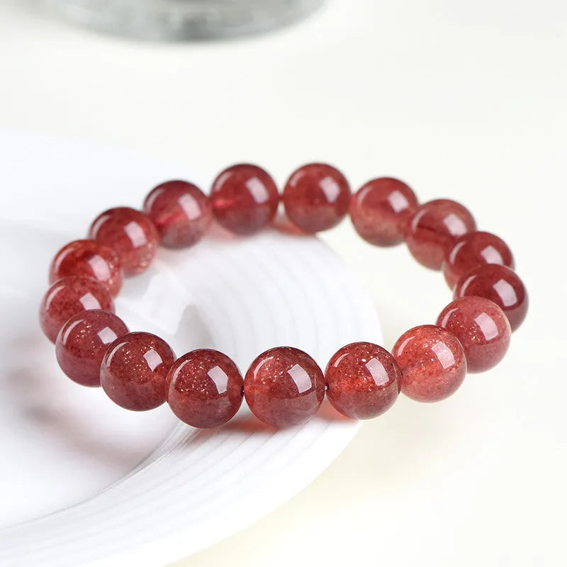 Natural strawberry quartz bracelet with geometric stones in starlight cherry red colour, shown in three size variations