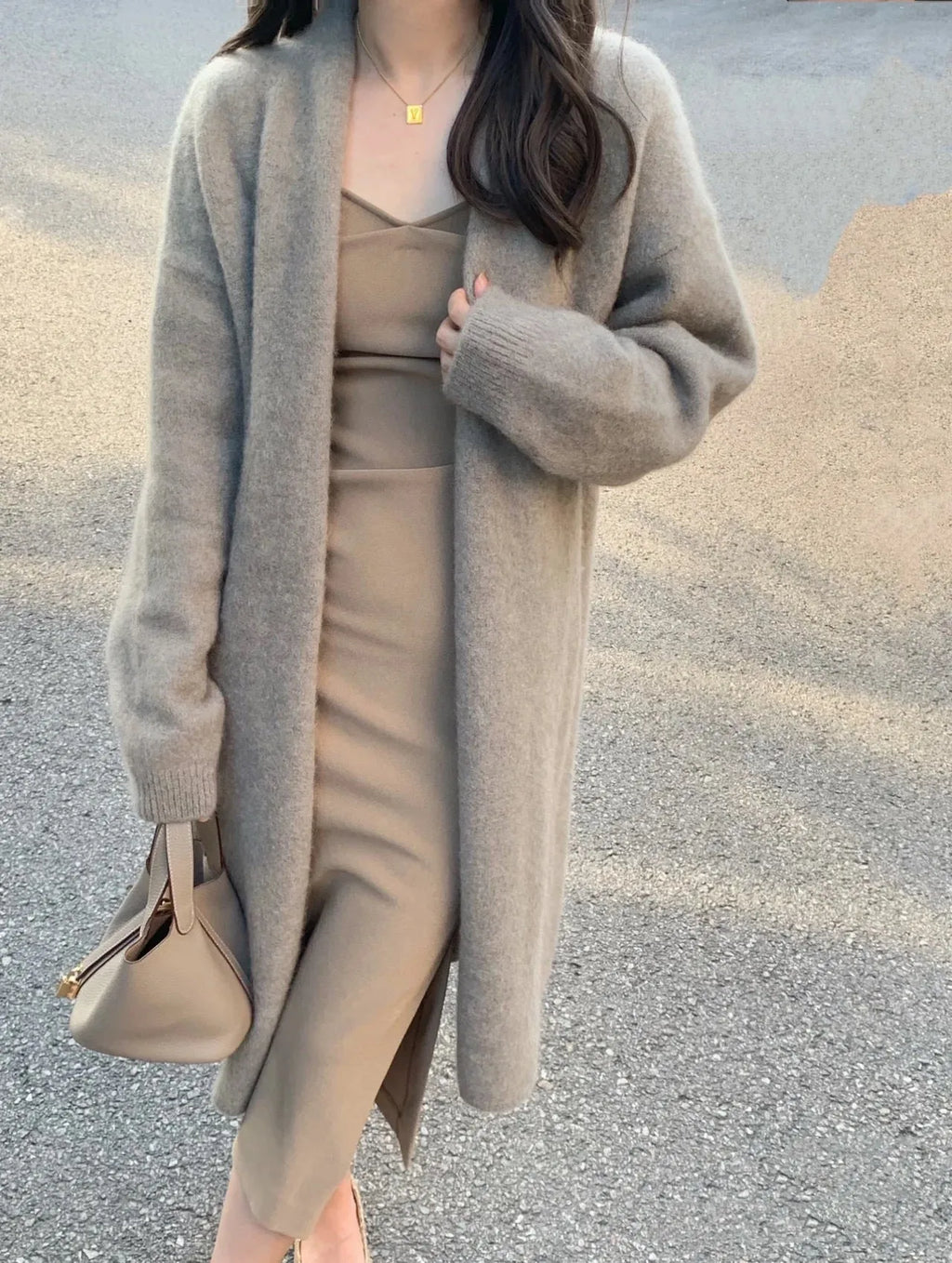 Women's medium length V-neck knitted cardigan in loose free size, shown in khaki colour