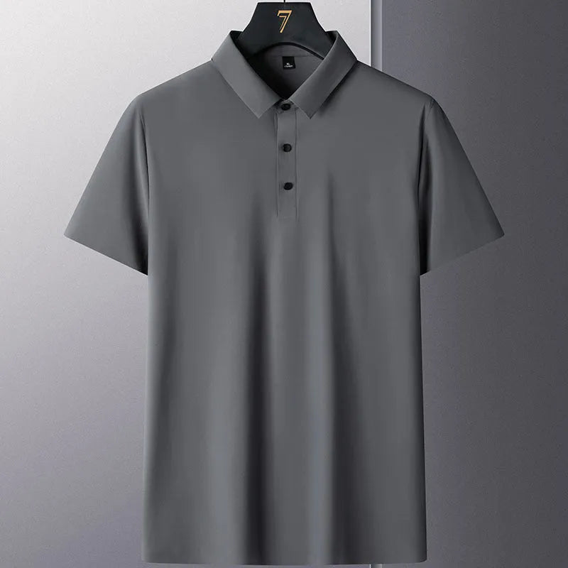 Man wearing a solid colour non-ironing short sleeve business casual shirt in a nylon blend fabric.