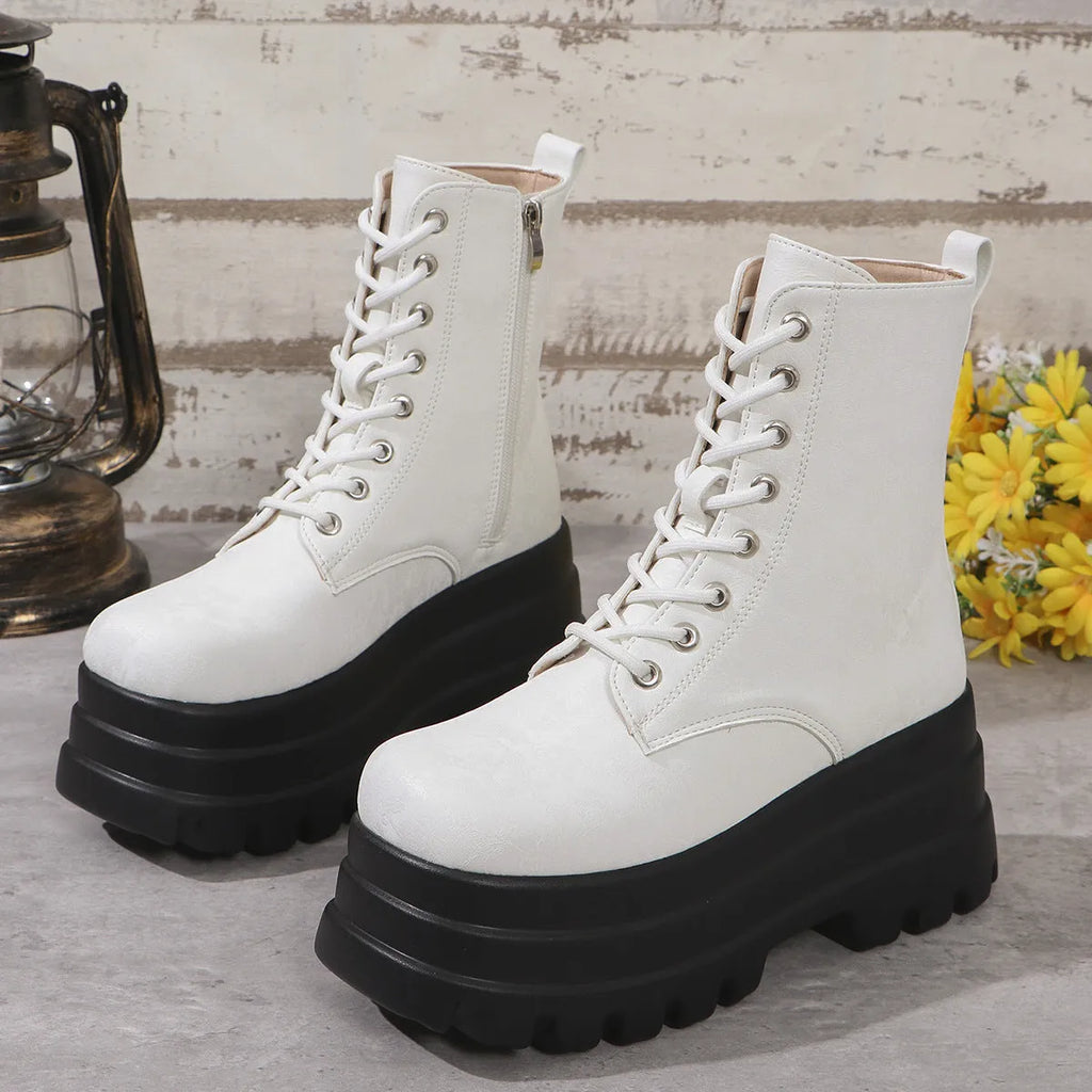 Women's white retro platform ankle boots with patchwork detail and a chunky heel.